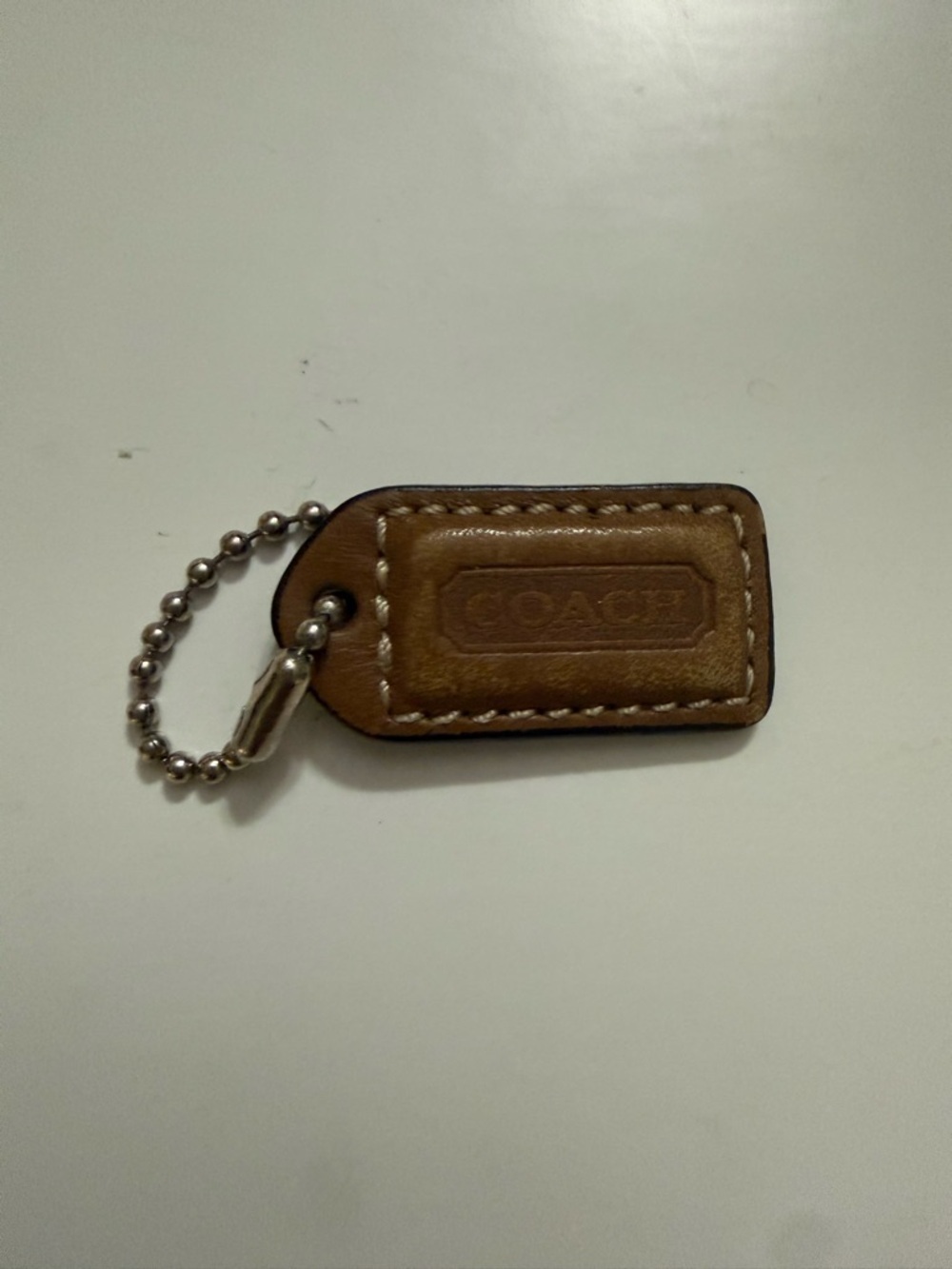Coach Tan Leather Embossed Logo Key Tag with Ball Chain